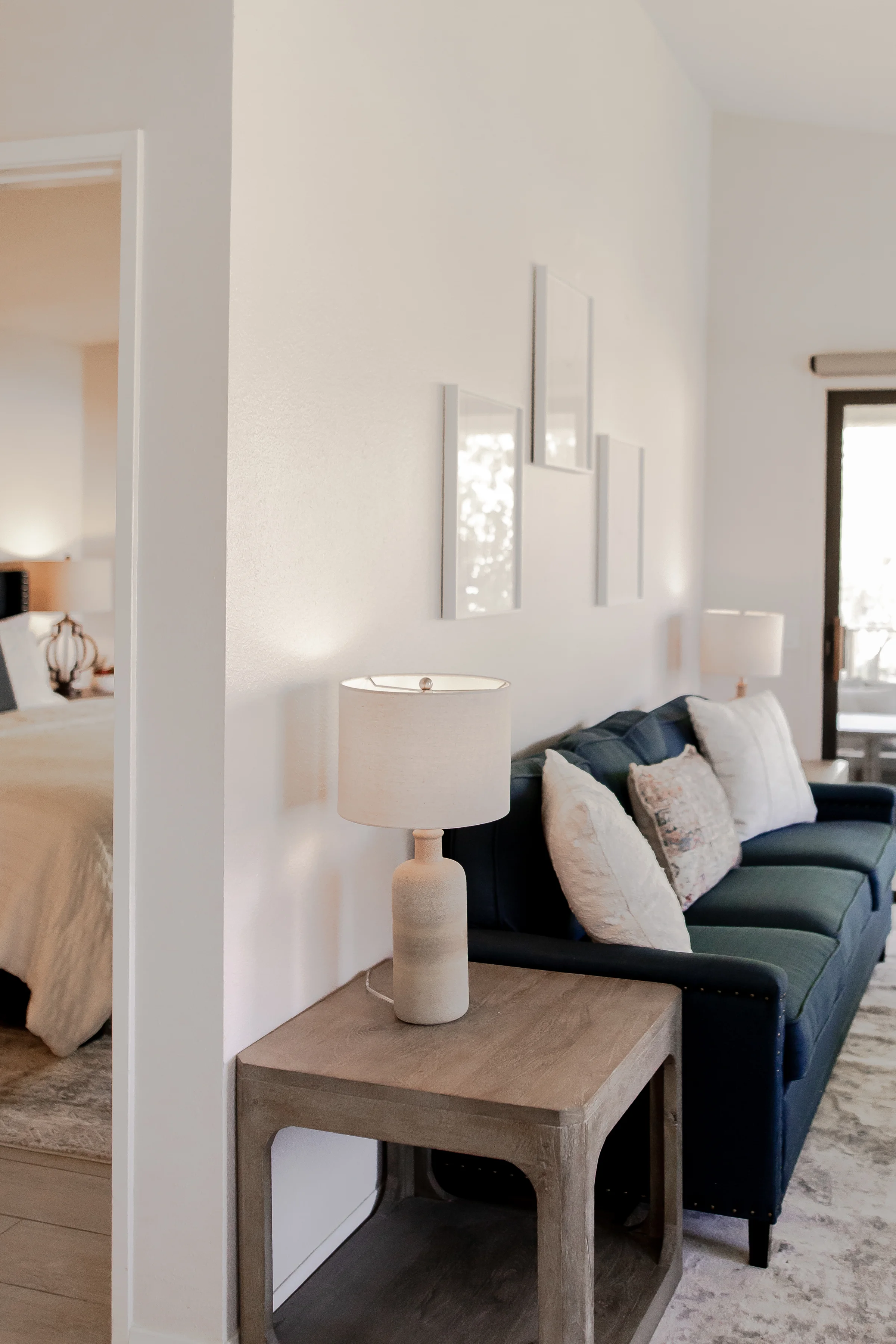 Living area with sofa and bedroom view at The French Swan, PGA West